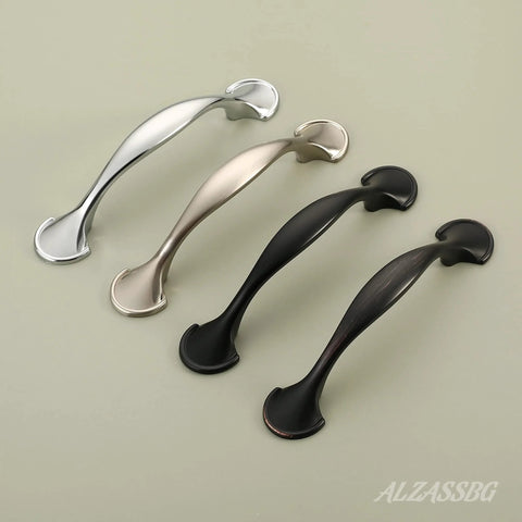 Various finishes of arch style cabinet pulls, showcasing oil rubbed bronze, 3 inch hole centers, solid metal handles for cabinets and furniture