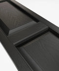 Close-up of Two Equal Panel Vinyl Shutters 12 Inch Wide By 31 Inch High Black With Raised Panel Design Includes Shutter Loks And Screws