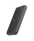 Tiny But Mighty 5000mAh Magnetic Power Bank in sleek black design, compact and lightweight portable phone charger.