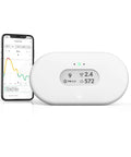 Battery Powered Indoor Air Quality Monitor With Wi Fi Connectivity For Radon PM2 5 CO2 VOC Humidity Temperature And Air Pressure Real Time Readouts next to smartphone displaying data