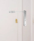 Automatic Stainless Steel Door Closer for Home and Office installed on white door in a hallway, showing durable silver finish.