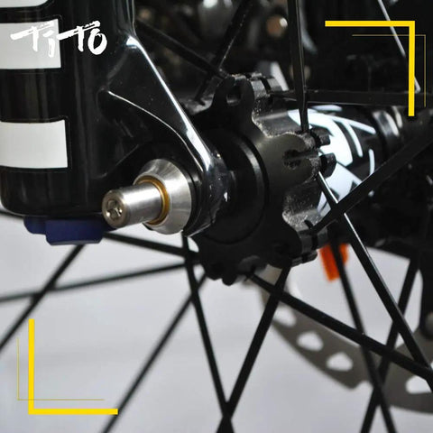 Close-up of Ultra Lightweight Titanium Quick Release Skewers Set installed on a road bike disc wheel hub.