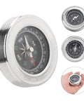 Mini Stainless Steel Compass For Camping And Hiking, showing silver finish and pocket size in hand, Portable Survival Navigation Tool