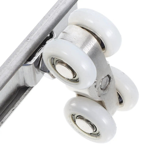 Close-up of heavy duty wheels from Top Notch Two Piece Stainless Steel Barn Door Roller Hardware for smooth sliding.