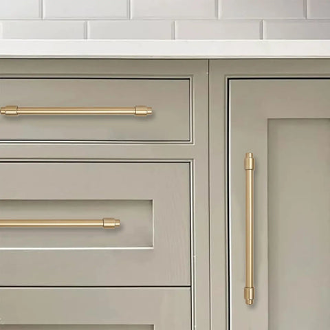 5 Pack Brushed Brass Cabinet Pulls Zinc Alloy Die Cast Modern Minimalist Hardware on gray kitchen cabinets, 4.75 inch length.
