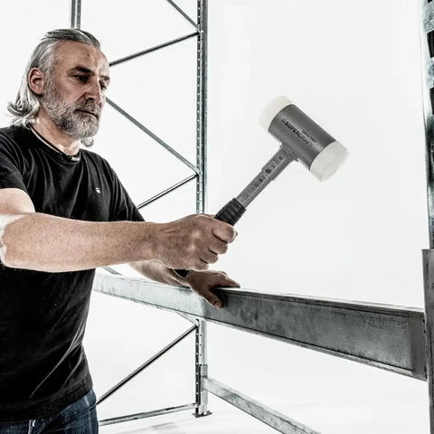 Man using Dead Blow Mallet With Non-Rebound Action, 50mm Head, 2.5 Lb Weight, Heavy-Duty Nylon Inserts, Break-Proof Steel Tube Handle