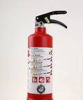 Heavy Fire Extinguisher Combo Featuring Fast Deploy Japanese Handle And Versatile Compact Multi Angle Spray For Badass Home Kitchen Emergency Defense Gear, red with safety instructions.