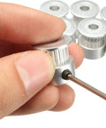Close-up of aluminum pulley from 5M GT2 Timing Belt Kit For 3D Printers, 20 Tooth, with Allen wrench adjusting screw.