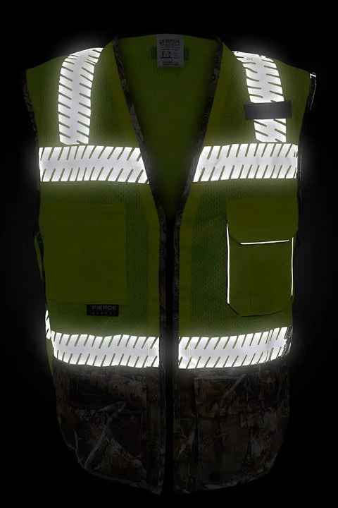Kickass Class Two Surveyors Safety Vest Featuring Sleek Camo Lower Panel And Striking Reflective Taping Built From Zero Sweat Polyester Mesh For Daily Crew Grind Or Weekend Wild Hunt Ready Setup In Large showing reflective taping and camo lower panel.