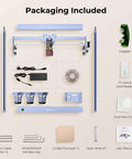 Creality Falcon 5W laser engraver with blue frame; packaging includes goggles, power adapter, wrench, plywood.