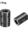 Two black oxide steel shaft couplings with four set screws; 1/2" bore, 1" OD, 1-1/2" length.