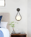 Mid Century Globe Wall Sconce Light With Brass Finish Modern Vanity Wall Lamp Opal Globe Glass 8.26 Inch Diameter 18.1 Inch Height Sleek Minimalist Drop Style Elegant Bedroom Living Room Accent Lighting