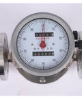 Tough As Nails Stainless Steel Oval Gear Flow Meter For Harsh Chemical Jobs And RV Heaters, showing gauge face and flanged connections.