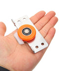 Hand holding component of Full Extension Drawer Slides Set With Door Pulley for Sliding Cabinets, featuring quiet tandem rollers