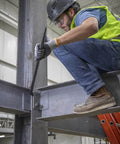 Worker using Ergonomic Round Connecting Bar 7/8 Inch Wide By 30 Inch Long With 15 Degree Angled Chisel, Tapered End For Seamless Bolt Hole Alignment