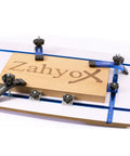 Six Pack T Track Hold Down Clamps Kit With Three And A Half Inch T Bolts For Woodworking Each Clamp Measures Six And One Third Inches Long By One And One Fifth Inches Wide Heavy Duty Anodized Woodworking Clamps In Starlight Blue securing wood on workbench