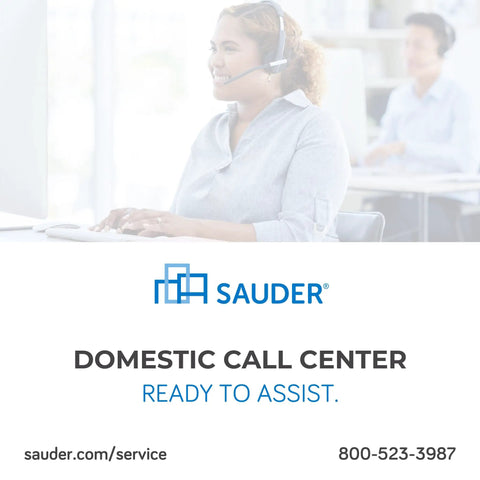 Woman in headset at computer in Sauder domestic call center, text reads 'Ready to Assist', contact info with phone and website link.