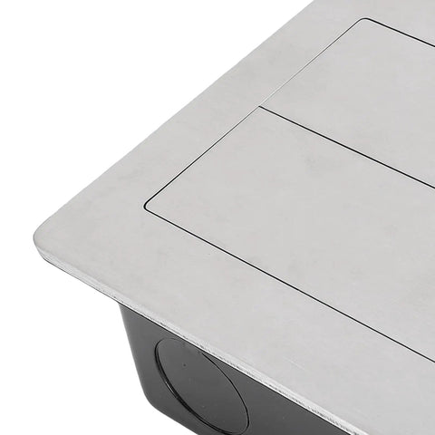 Slick Recessed Floor Power Box Featuring Double Electric Receptacles With Smooth Sliding Cover For Modern Homes with stainless steel top.