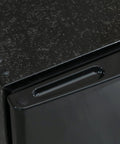 Top view of Slick 1.1 Cu Ft Compact Mini Upright Freezer With Removable Shelves And A Reversible Door showing textured surface.