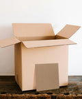 Open box with 12 Pack Cardboard Box Dividers For Moving And Packing Supplies Protective Filler Pads For Fragile Items inside