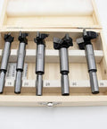Rock Solid 5 Piece Forstner Drill Bit Set Packing Tungsten Carbide Tips, various sizes in wooden box for smooth wood hole cutting.