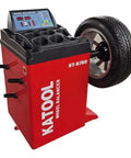 Industrial Grade Tire Changer And Wheel Balancer Combo With Two Horsepower Bead Blaster And Hardened Alloy Steel Jaws on red wheel balancer with display.