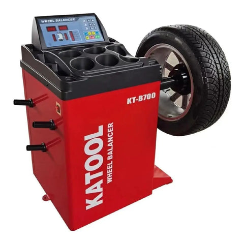Industrial Grade Tire Changer And Wheel Balancer Combo With Two Horsepower Bead Blaster And Hardened Alloy Steel Jaws on red wheel balancer with display.