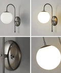 Upgrade Your Vibe With Sleek Brass Wall Sconces Featuring Handcrafted White Glass Globe Shades Ideal For Modern Farmhouse And Bedroom Lighting E27 Socket. Wall sconce showing white glass globe and brass details.
