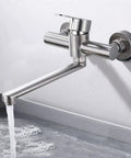 360° Rotatable Wall-Mounted Stainless Steel Kitchen Faucet - Single Handle Mixer Tap for Sink and Cooking, water flowing.