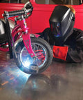 Person welding a bicycle while wearing K2800-1 4.5 By 5.25 Inch Auto Darkening Weld Helmet With Grade Ten Lens ANSI Certified helmet.