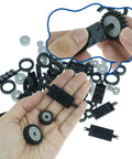 Close-up of hand holding City Car Wheels Tires And Axles Kit Set for Vehicles and Trucks with major brand compatibility.