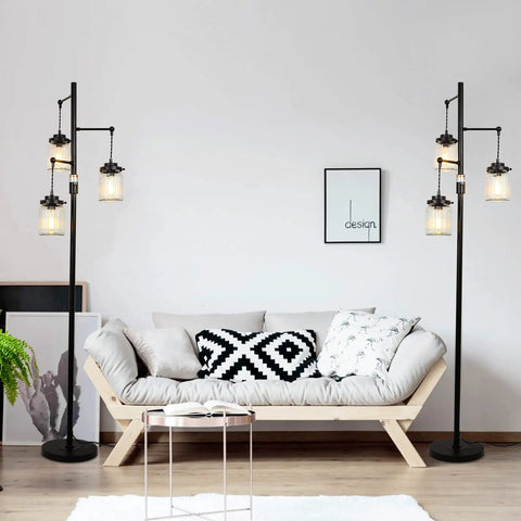 Industrial Farmhouse Floor Lamp With Three Glass Shades, Tall Standing Lamp With Dimmable Switch, Sturdy Black Base For Living Room Bedroom Office Home Decor, Modern Rustic Lighting That Hits next to a modern sofa