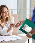 Green Bubble Mailers 12x16 Inch 40 Pack Padded Envelopes With 12x15 Inch Usable Size held by courier in office setting