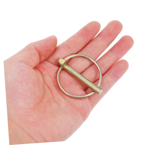 Heavy Duty Lynch Pin 8 Pack Kit for Trailers Trucks and Mowers Galvanized Safety Pins to Lock Hitches Secure Gear and Keep Your Rig Ready on Vehicles and Attachments, galvanized lynch pin in hand