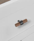 Walnut Wood Cabinet Pull Handle With Black Finish attached to white drawer, 4.25 Inch Center To Center, elegant kitchen hardware