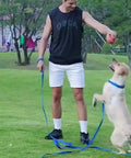 Man training dog with Long Dog Training Leash 15ft 20ft 30ft 50ft 100ft For Small And Medium Dogs Braided Nylon Lead