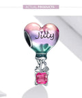 Hot Air Balloon Birthstone Charm For Bracelets In Sterling Silver Ideal Gift For Women July Birthstone Jewelry Fun Birthday Charm To Show Off Personal Style And Make A Totally Sweet Keepsake Accessory; a colorful silver charm with pink July stone.