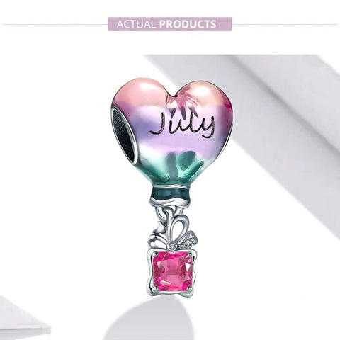 Hot Air Balloon Birthstone Charm For Bracelets In Sterling Silver Ideal Gift For Women July Birthstone Jewelry Fun Birthday Charm To Show Off Personal Style And Make A Totally Sweet Keepsake Accessory; a colorful silver charm with pink July stone.
