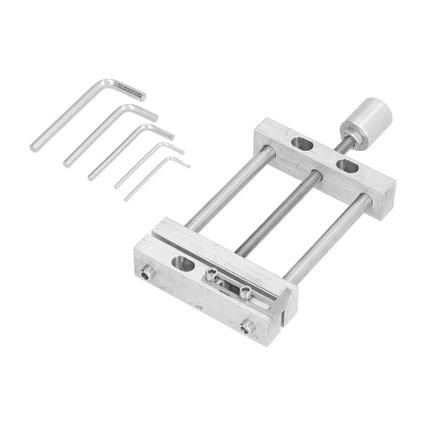 Compact Aluminum Alloy Bench Vise With Drill Press Mount For Woodworking And Engraving Features Ninety Millimeter Jaw Opening and included hex keys.