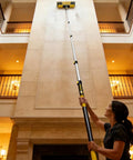 Heavy-Duty Commercial Extension Pole Delivers 4.5 To 18 Ft Reach For True Two-Story Access Up To 24 Ft Total in use for cleaning eaves