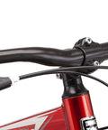 Handlebars of Flatrock DX Mountain Bike With 29 Inch Wheels 21 Speed Drivetrain Aluminum Frame Front Suspension Twist Shifters And Mechanical Disc Brakes