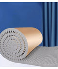 Heavy Duty Sound Proof Padding With Slick Water Resistant Acoustic Foam For Room Noise Cancelling And Super Quick Rebound Egg Crate Wall Panels Easy Peel Stick Game Changer displayed in a rolled form with texture visible.