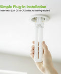 Hand installing Pack Of 4 13W GX23 CFL Light Bulbs With 2 Pin Plug In Base 3500K Neutral White U Shaped Tubes into ceiling fixture