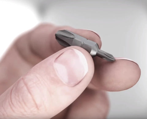 Close-up of a magnetic bit from 26InOne Ultra Driver Set 14 Piece Kit With Magnetic Bits And Precision Screwdrivers For Home Auto And Workshop Use Built Tough Versatile Hand Tool Collection.