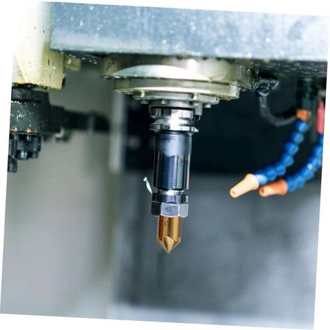Installed UKCOCO flute steel chamfering cutter in a milling spindle; gold-colored bifurcated tip, black shank