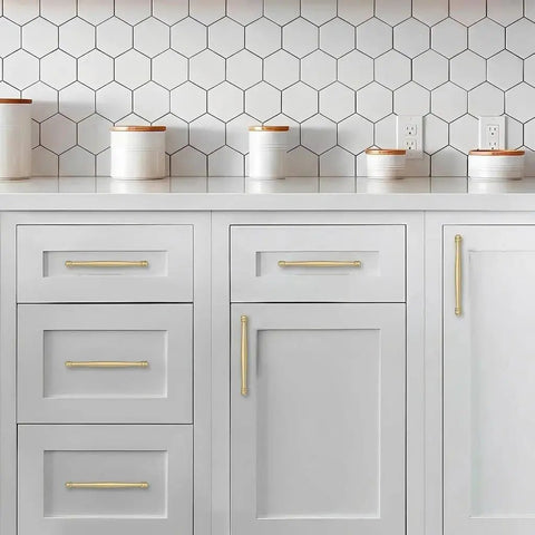 Sturdy As A Rock 10 Pack Premium Brushed Gold Cabinet Pulls 5 Inch 128Mm Hole Center on white kitchen cabinets.