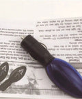 Gas Saver 5 Pack Plug And Play Fuel Economy Booster For Cars And Trucks 12V Vehicle Saving Device on a paper background