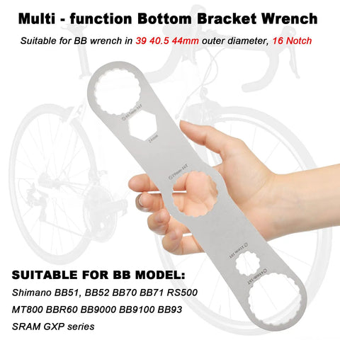 Multi Function Bottom Bracket Wrench for 39 40.5 and 44mm outer diameter, stainless steel, 16 notch, held by hand against bike background.
