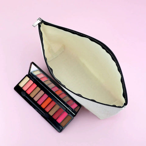 Open Im Not Lost Geocaching Gift Makeup Bag For Women with a makeup palette on pink background
