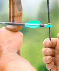 Close-up of bow string with nock and arrow, Must Have Archery Bow String Nocking Points Set With T Square Ruler And Nock Pliers Including 6 Brass Nocks